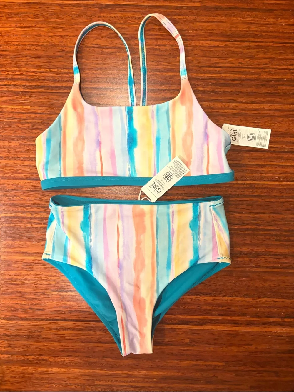 NWT Athleta Girl Reversible Pastel Watercolor Rainbow Bikini Size M/L